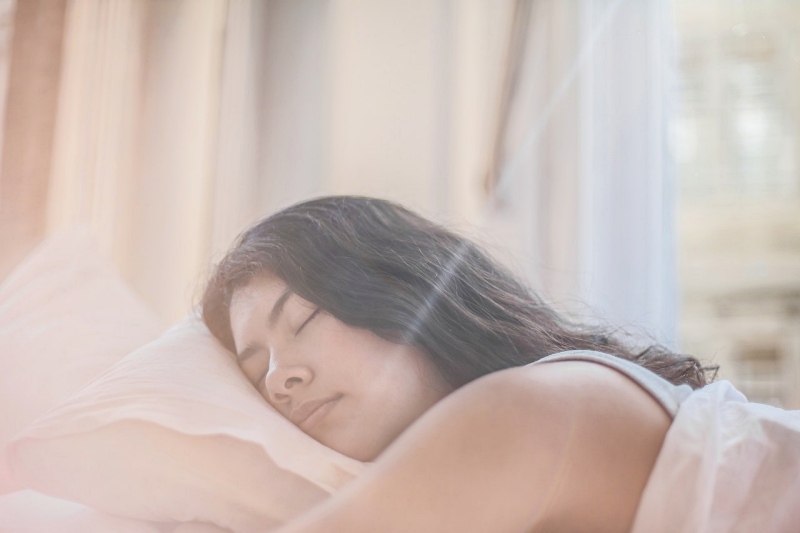 photo of woman sleeping | foods that help you sleep