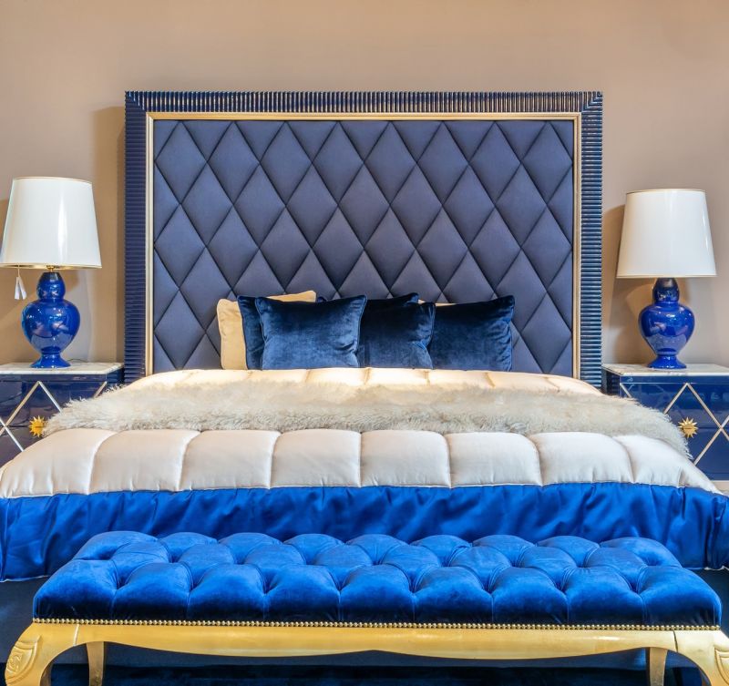 bed with blue upholstered headband | Serta hotel mattress