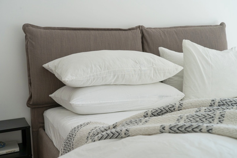 white pillows on a bed | spring mattress