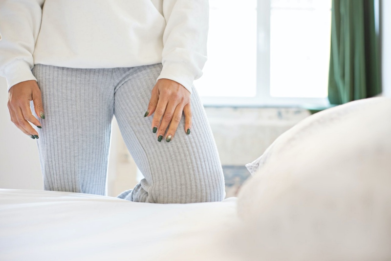 a person wearing gray pajama | joint pain