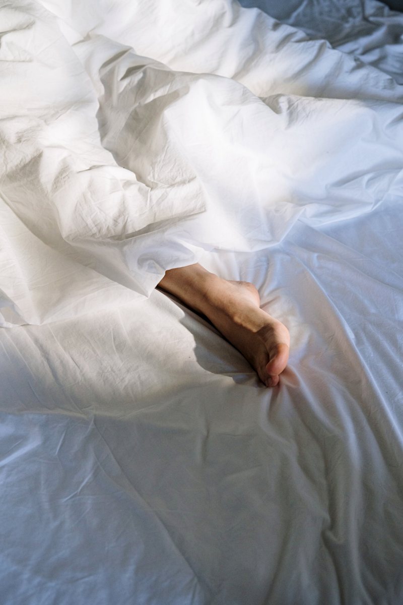 feet girl bed bedroom | types of firmness in mattresses