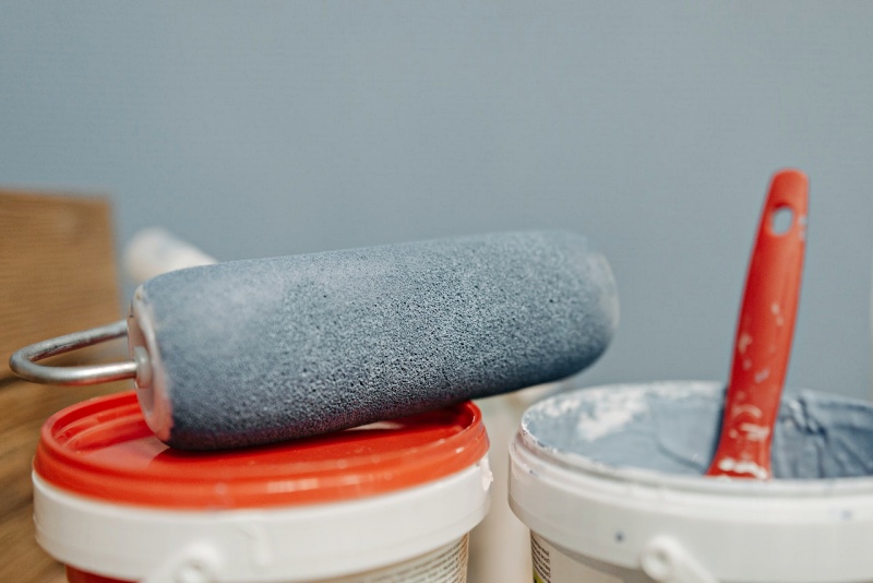 paint roller on top of a pail | bedroom colors