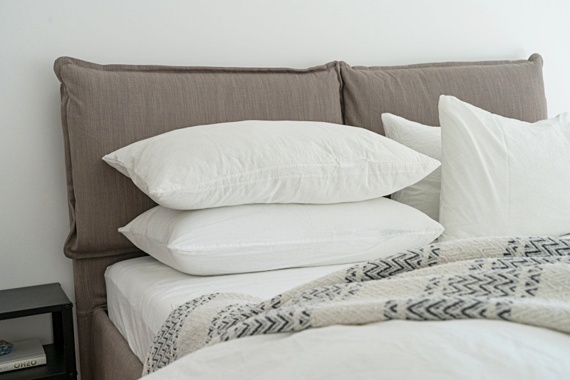 white pillows on a bed | memory foam pillow