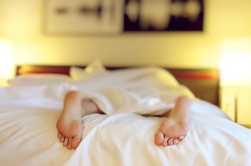 alone bed bedroom blur | benefits of orthopedic mattresses