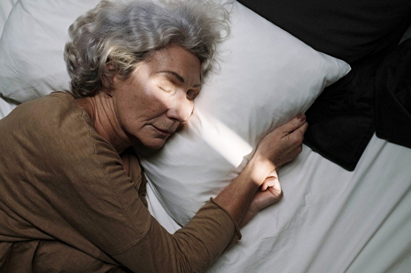 an elderly woman sleeping | memory foam